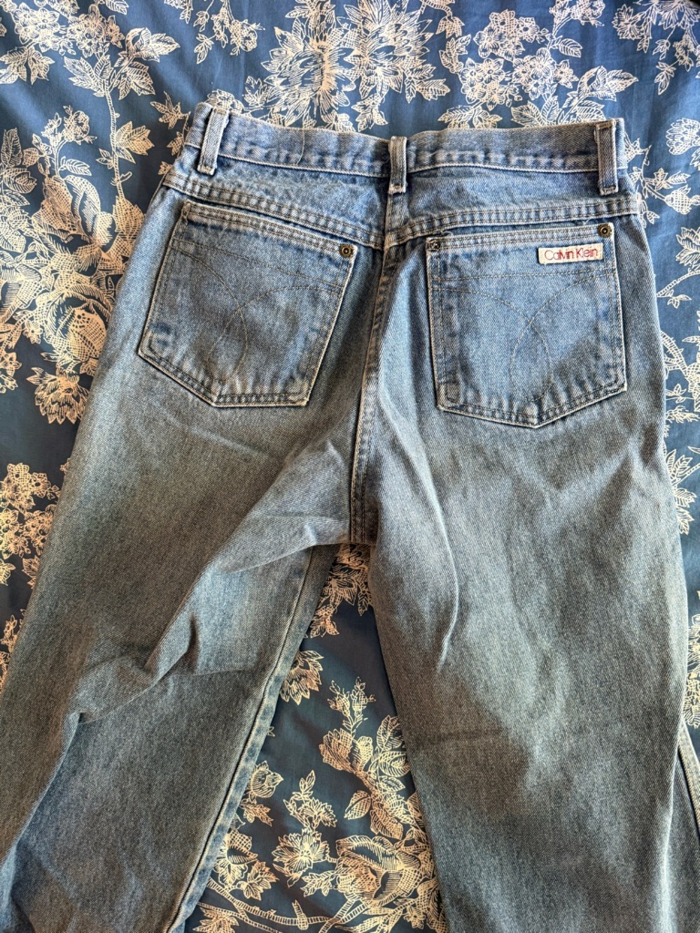 Calvin Klein Light Blue Denim Jeans with Branded Button